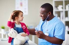 pediatric nurse caring for a child