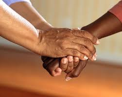 hands holding for Alzheimer's disease care